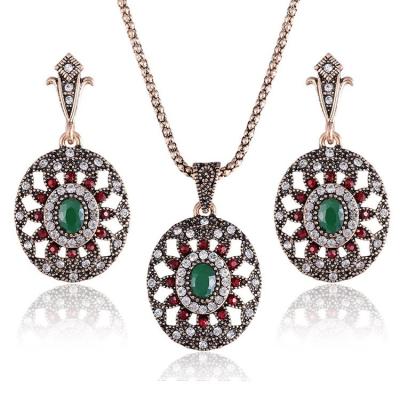 China Vintage Manufacturers Wholesale Antique Cheap Wholesale Crystal Oval Shape Emerald Ruby Necklace And Earrings Sets For Women for sale