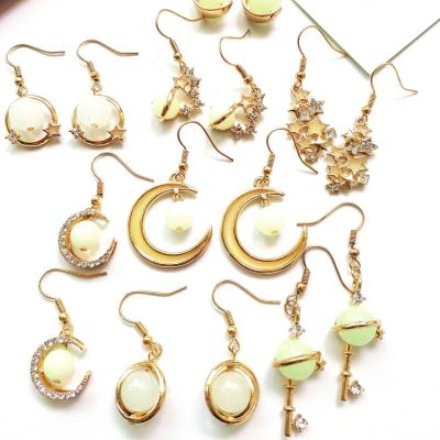 China Wholesale Casual/Sporty Series Gold Galaxy Planets Factory Pearl Key Moon Luminous Star Dangle Earrings For Women for sale