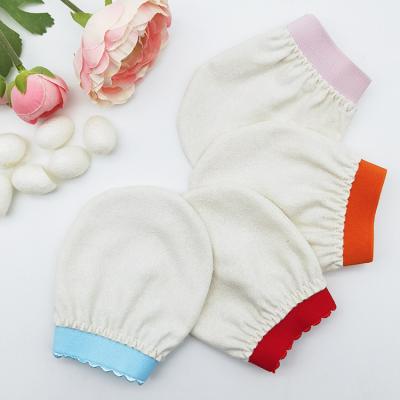 China EXFOLIATING 100% Private Label Raw Cocoon Silk Face Gloves Exfoliating Body Scrub Glove Removal Glove Dead Skin Remover for sale