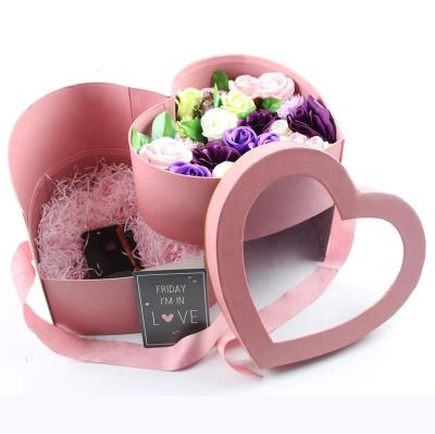 China Recycled Rotary Materials Cardboard Paper Shipping Luxury Ribbon Valentines Day Flower Heart Shaped Gift Boxes Packaging I Love You for sale