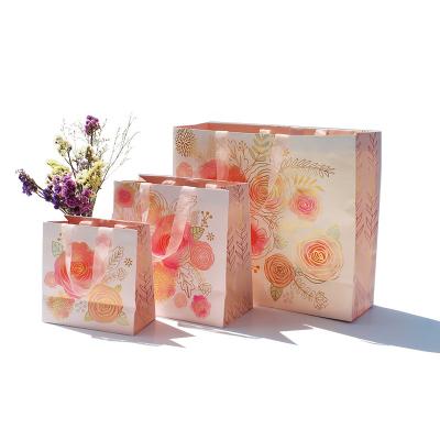 China Recycled Materials Extra Large Fabric Dog Birthday Party Marble Printing Customize Rose Box Pink And Gold Eco-Friendly Paper Gift Bags for sale