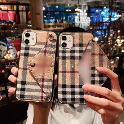 China New Luxury Anti-fall Tpu Backstrap Anti-fall Dustproof Anti-slip Phone Case With Card Holder Slot for sale