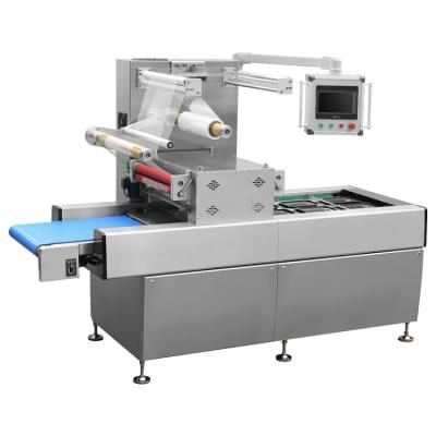 China Hot Selling Continuous Food Vacuum Tray Sealer Machine Egg Tray Sealing Machine for sale