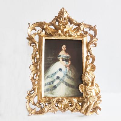 China Hollow Resin Gold Wedding Photo Frame Resin Photo Frame Birthday Gift Photo Frame Decoration European Creative Relief for sale