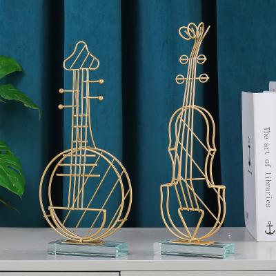 China Nordic light luxury gold musical instrument decoration metal violin desk bookcase metal handwork home equipment for sale