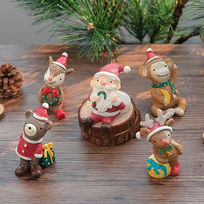 China Resin Wholesale Mini Santa Claus Mini Resin Ornament Christmas Gift Decoration Elks Resin Craft Decoration for sale