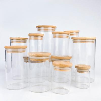 China Household Products Wholesale Borosilicate Jar Food Milk Spice Storage Containers Glass Bottle Cups Highs With Bamboo Lid for sale