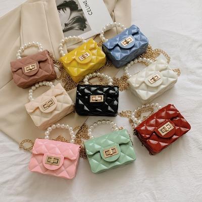 China Fashionable Waterproof Kids Designers Bag Cute Kids Handbag Mini Jelly Bag Wholesale Little Pearl Girl Mini Shoulder Chain Bag for sale