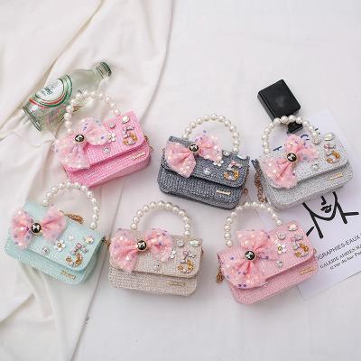 China New Arrival Waterproof Bow Children Beads Cross - Body Bag Little Girl Soft Mini Chain Handbag Mini Shoulder Bag For Kids for sale