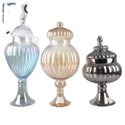 China Stocked Handmade Glassware Wedding Decorations Colored Ribbed Glass Jar for sale