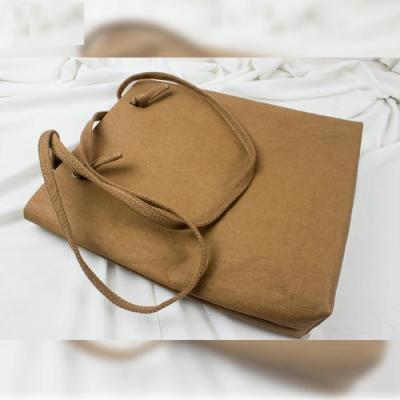 China Recycled Materials Custom Printed Strong Washable Kraft Paper Shopping Bag With Handle Grocery Bag Gift Bag for sale