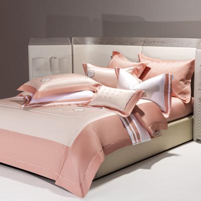 China Folded Luxury Bed Sheet Set 100% Long-staple Cotton Bedding Set Pink European Badges Quilt Cover for sale