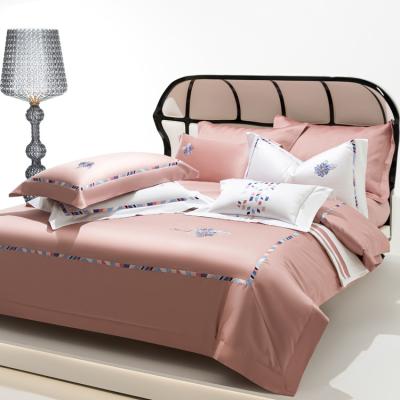 China Folded 2023 Hot selling high quality pink  jacquard bedsheets sets king size 100% cotton bed set Factory customized sheets for sale