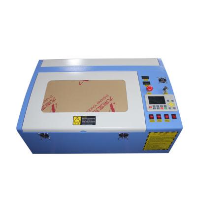 China Laser Engraving 40w CO2 Laser Metal Engraving Machine With Digital Function High Speed ​​Working Size 300*200mm for sale