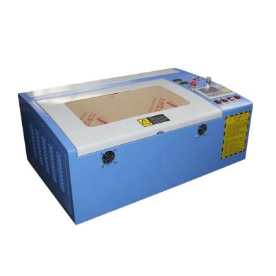 China MDF Laser Engraving For Leather Wood Laser Engraving Machine 6040 Laser Cutting Machine 50w 4060 Linear Guide Acrylic Rubber Plastic Glass High M2 for sale