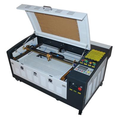 China Laser Engraving Glass Wine Bottle CO2 Laser Engraving Machine 50w Linear Guide 50w Mini Wood Rubber Plastic Stone Portable Leather 4060 m2 for sale