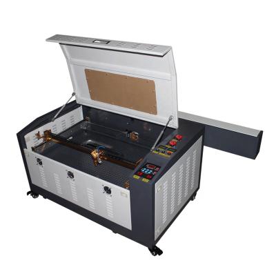 China Laser Engraving Hot Sale Ainix Top Configuration 80w 4060 Laser Cutter Ruida CO2 System 50w 60w 80w 6040 Rubber Leather Mini Laser Engraving for sale