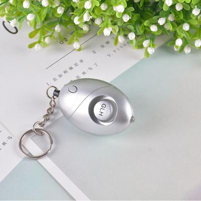 China Loud Sound Portable 140db Emergency Alarm Key Chain Personal Self Defense Loud Whistle Alarm For Lady Children for sale