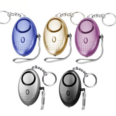 China LED Flashlight Egg Shape Self-defense Alarm Products Security Necklace Key Chain Personal Alarm Bracelet for sale