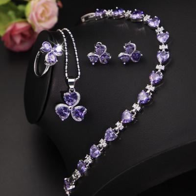 China Short Necklace Diamond Jewelry Set Romantic Purple Zircon Clavicle Clover With Finger Ring Earrings Bracelet for sale