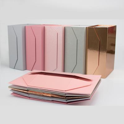 China Recycled materials wholesale high-gradeFfolding wig shirt special paper embossed pink foldable gift box magnet buckle for sale