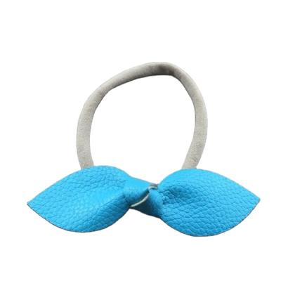 China Factory Wholesale Soft Colorful Elastic Leather Newborn Bow Headbands Baby Nylon Hair Band for sale