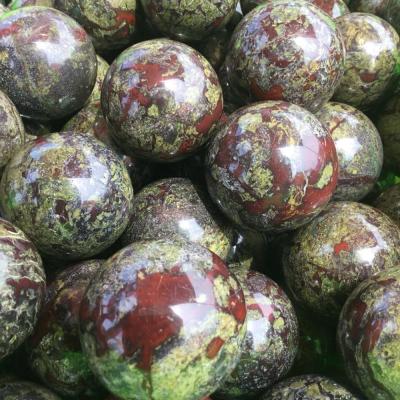 China China Wholesale Natural Crystal Therapy Sphere Dragon Blood Stone Ball Polished for sale