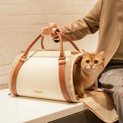 China Viable Luxury Pet Carrier Bag With Fashion Design New Arrived Cat Dog Bag Outdoor Travel Pet Handbag for sale