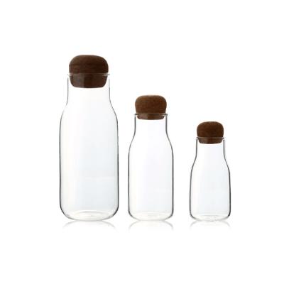 China High Borosilicate Glass Jar Viable Glass Water Bottle With Cork Stopper Lid , Glass Pitcher for sale