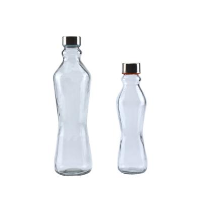 China Viable wholesale premium 1 liter glass bottles transparent glossy bottle water for sale