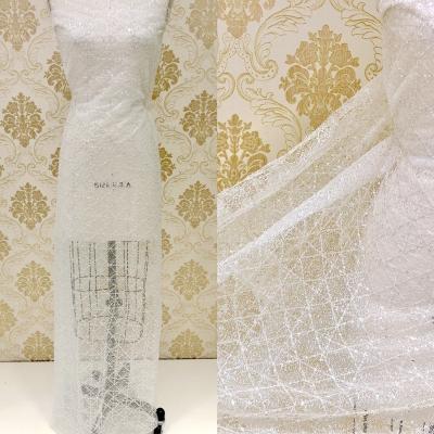 China Elastic Most Popular Premium Quality Wedding French Lace With Crystal Sequins Heavy Beaded Fabric Bridal for sale