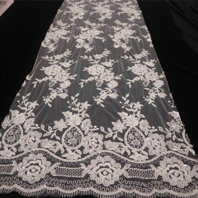 China Sustainable Lace Product Type And Beaded And Tying Embroidered Bridal Lace Tulle African 100% Polyester Fabric for sale