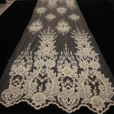 China Ankara vintage sustainable fashionable sequins embroidered bridal lace fabric with handmade beads and cords for sale