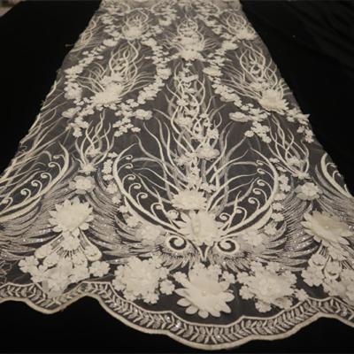 China Viable Splendid Handmade Floral 3D Flower Sequins Embroidered African Bridal Net Lace Fabric for sale