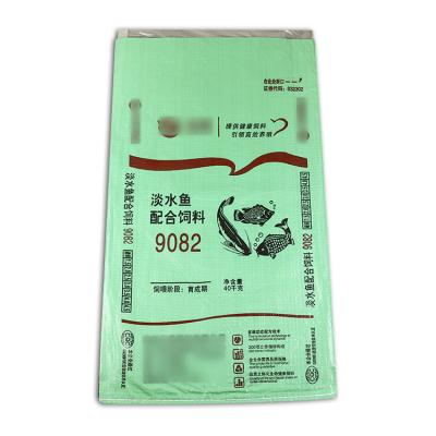 China 40kg PP Woven Fish Feed Bag Packaging Moisture Proof Promotional Laminated Plastic Bag With PE Coating for sale