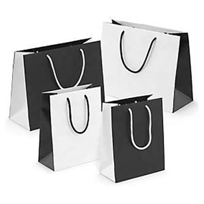 China Recycled Materials Luxury Custom Paper Bag With Logo Retail Bags Bolsas De Papel for sale