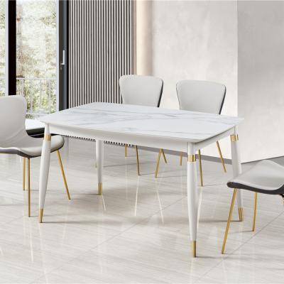 China Modern Nordic luxury household dining table solid wood rectangular lightweight luxury dining table for sale