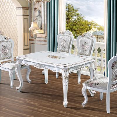 China Solid Wood French Style Dining Solid Wood Ivory White Antique Dining Table Latest Furniture Style Design for sale