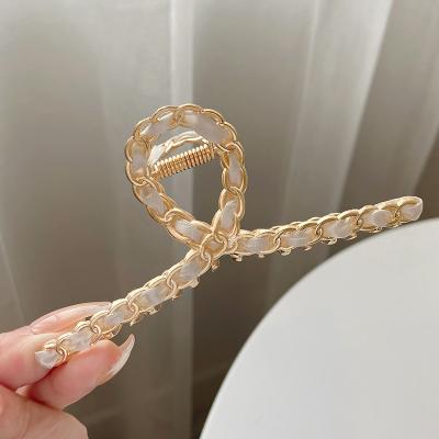 China 2022 European and American style metal fabric hair accessories wholesale bestsellers alloy chain shark hair claw clip products plated blonde clips for sale