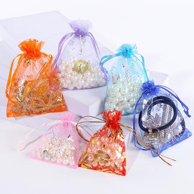 China Custom Jewelry Organza Gift Bags For Water Floral Gift Bags Eco Friendly Yellow Luxury Drawstring Bags for sale