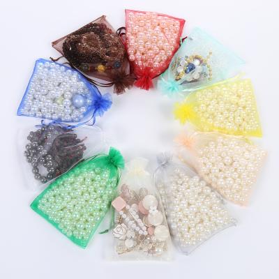 China Factory Wholesale Small Jewelry Cosmetic Packaging Bag Drawstring Organza Drawstring Bag Bottle Mesh Organza Pouches 9*12Cm for sale