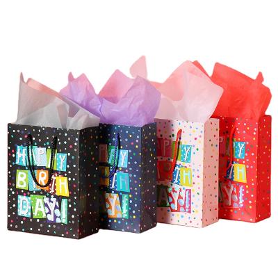 China 4 Color Options Recyclable Colorful Dotted White Orange Blue Black Paper Bags 17*23CM Birthday Paper Bags for sale