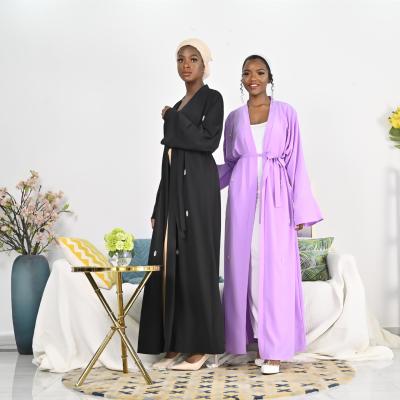 China Viable Style Beaded Open Muslim Cardigan Abaya Dubai Black Muslim Abaya Long Celebrity Flower Pattern Women for sale