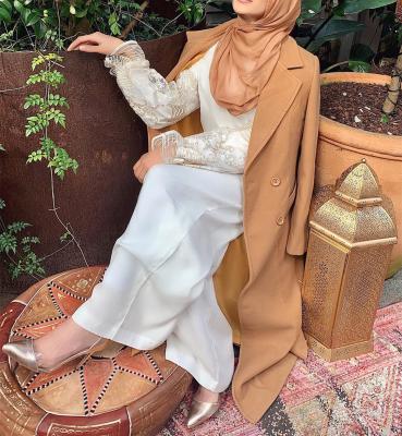 China New workable loose muslim woman long dress elegant and fashionable muslim warm woolen overcoat long long dress for sale