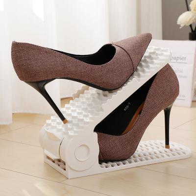 China Hot Selling Adjustable PP Plastic Adjustable Plastic White Black White Shoes Stretch Organizer Shoe Slots for sale