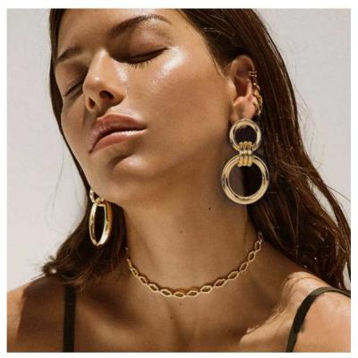 China TRENDY round sunburst seal earrings spread sunlight jewelry gold pvd coating stainless steel stud earring for women for sale