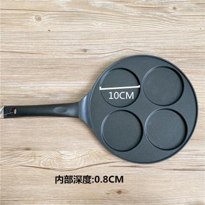 China Durable die cast aluminum portable non-stick 4holes fry pan with bakelite handles 26cm pancake bakeware for sale