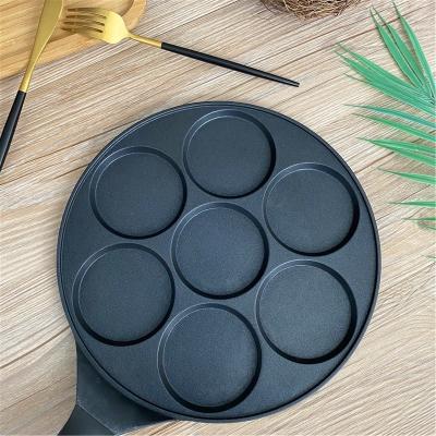 China Viable 7 Hole Home Kitchen Using Pan Manufacturers Aluminum Die Cast Skillet With Wooden Handle for sale