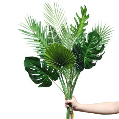 China Lowest Price Modern Wholesale Artificial Palm Green Leaves For Decoration for sale