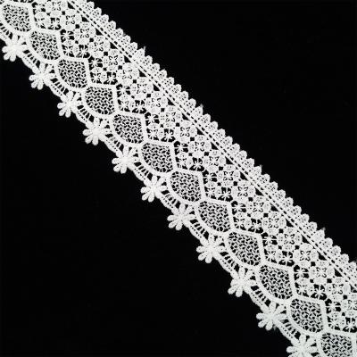 China 7cm Viable Warm White Chemical Polyester Lace Ethnic Embroidered Lace Trimming for sale